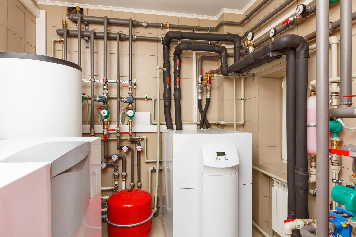 Modern central heating system with pipes and boiler.
