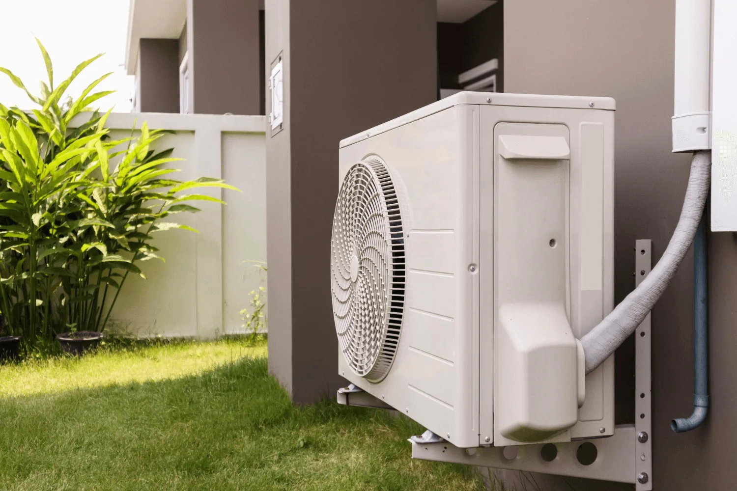 Outdoor air conditioner unit on building exterior